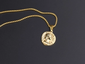 Detail of gold titanium steel Roman portrait coin pendant with classic box chain necklace