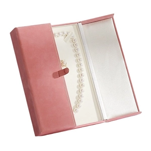Pink velvet European jewelry box with snap closure featuring pearl necklace and ring display