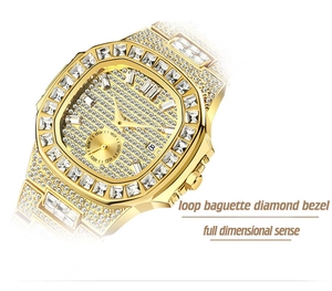 Detail of gold hip hop watch featuring baguette-cut diamond bezel and iced-out dial