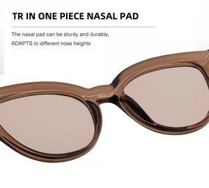 Macro view of the integrated nose pads on transparent brown cat-eye sunglasses frames