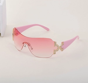 Detail of pink gradient Y2K oversized rimless sunglasses with rhinestone metal hinge
