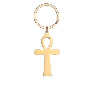 Detailed view of a golden stainless steel Egyptian Ankh symbol keychain on white background