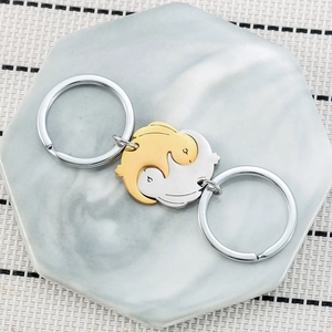 Cute bunny stainless steel keychain set in gold and silver finish with tai chi pattern