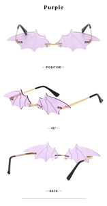 Three-view display of purple bat wing sunglasses with gold metal temples and rimless lenses