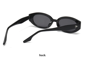 Detail showing back view of oval black frame sunglasses with printed size specs