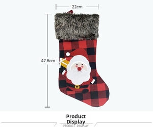 Detailed dimensions of red and black plaid Christmas stocking with Santa Claus applique