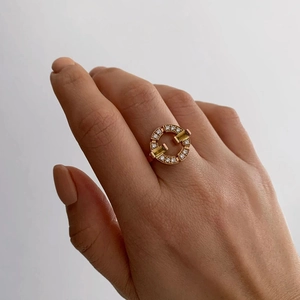 Elegant 18K rose gold ring featuring emerald zircon and pave diamonds in a T design
