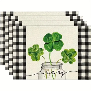 Detail view of 4-piece linen placemat set with St. Patrick's Day clover and lucky text