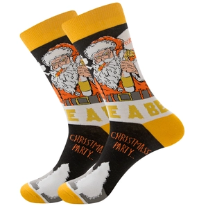Christmas socks with festive elk and snowflake patterns in black, yellow, and white colors