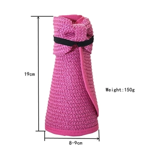 Pink foldable sun hat with bow detail, dimensions 19cm height and 150g weight shown