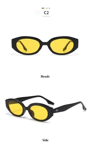 Detail view of vintage oval sunglasses in black frame with yellow lenses for women