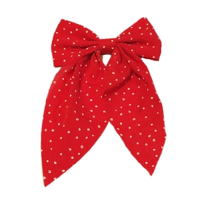 Red and white polka dot bow hair clip with long ribbons in elegant Japanese style