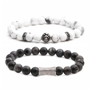Beaded bracelet set with white marble stone, grey lava rock, and metal lion head charms