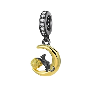Detailed charm pendant featuring a black cat sitting on a golden moon with zircon accents
