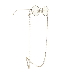 Gold flower link glasses chain with round metal frames on white background