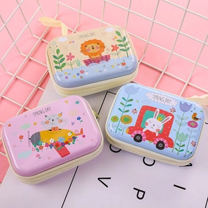 Detailed view of rectangle tinplate coin purses with colorful cartoon animal designs
