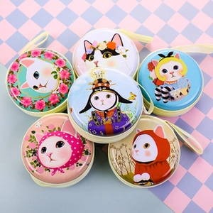Macro view of six round EVA coin purses with cat illustrations and colorful zippers