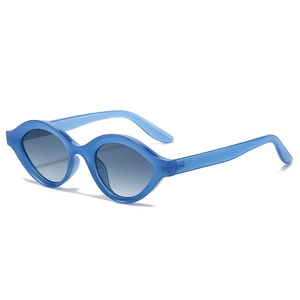 Lunettes de soleil œil-de-chat ovales bleues avec verres dégradés gris au style moderne
