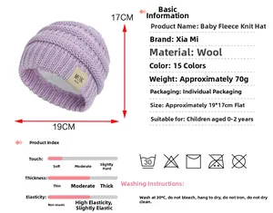Detail of purple knitted baby hat showing soft fleece lining and MOK KIDS leather patch