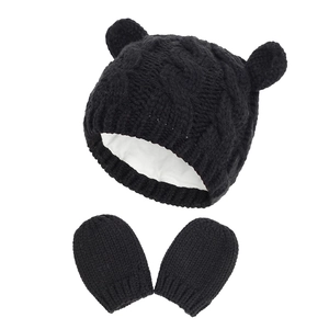 Detail view of baby knit hat and mittens set with bear ears and thick fleece lining