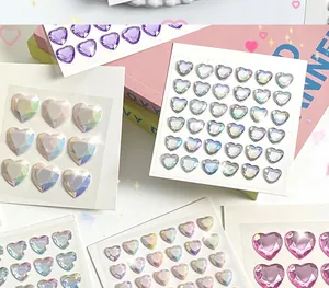 Detailed view of faceted 3D heart-shaped crystal gemstone stickers in vibrant colors