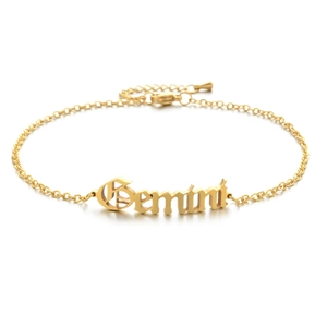 Macro shot of 18K gold plated Gemini zodiac anklet with fine chain and lobster clasp