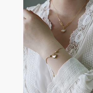 18K gold plated titanium necklace and bracelet set with white shell heart pendant