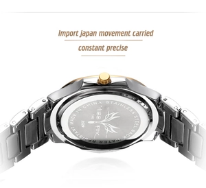Close-up of stainless steel watch back with water resistant engraving and model number