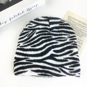 Cozy zebra pattern knit beanie in black and white for outdoor winter warmth