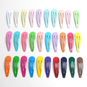 Detailed top view of 30 colorful 5cm metal BB hair clips arranged in neat rows