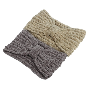 Close-up of beige and dark grey knotted chenille knit headbands with ribbed texture