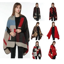 Close-up of knit patterns and diverse colors for women's oversized turtleneck ponchos
