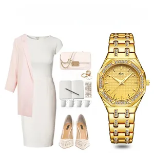 Close-up of golden octagonal watch with diamond bezel paired with professional outfit