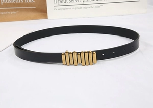 Minimalist black leather belt for women featuring a retro golden multi-cylinder metal buckle