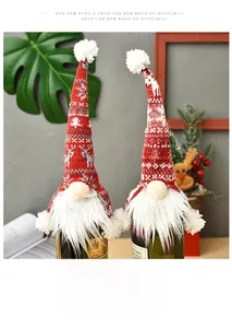 Macro detail of knit Christmas gnome wine bottle covers with elk and snowflake patterns
