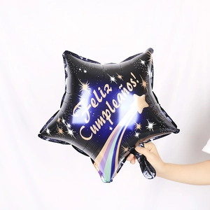 Star shaped blue foil balloon with gold Feliz Cumpleaños text for birthday party decoration