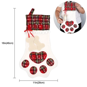 Detailed size chart for dog paw Christmas stocking with red plaid and bone charms