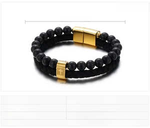 Detail view of mens black leather wrap bracelet with matte turquoise beads and cross charm