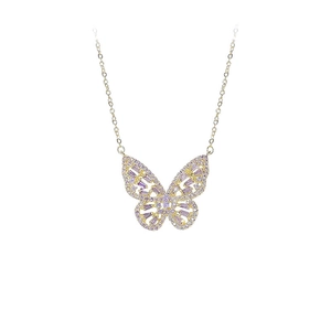 Gold butterfly pendant necklace with purple zircon stones and sparkling crystals