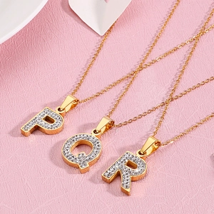 Gold plated stainless steel P Q R initial necklaces with sparkling crystal pavé