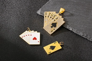 Detailed view of hip hop poker pendants with sparkling zircons and enamel finish