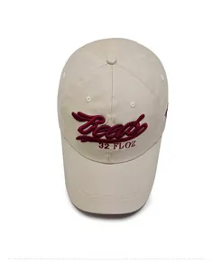 Top view of beige cotton baseball cap featuring burgundy 3D Beels letter embroidery