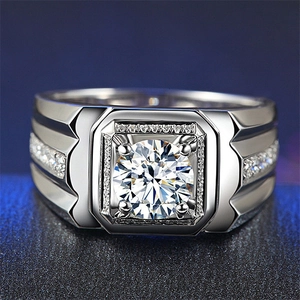 Silver moissanite ring featuring a round center stone and square halo setting