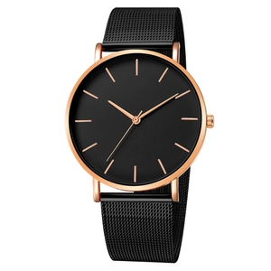Minimalist men's quartz watch with black mesh strap and rose gold metal case on white backdrop