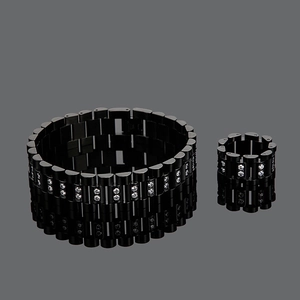 Detail of black link bracelet and ring set with micro-pave cubic zirconia accents