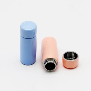 Miniature dollhouse vacuum flasks in light blue and pink with open lid showing detail
