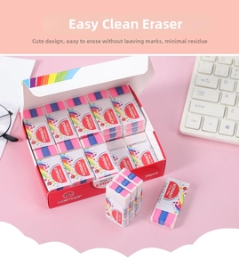 Close-up of three-color striped non-marking erasers in pink, blue and purple tones