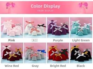 Macro view of velvet drawstring gift bags with satin bows in eight various colors