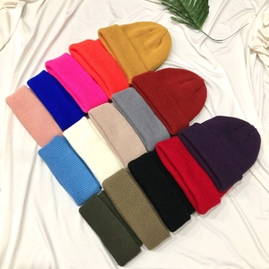 Minimalist vintage knit beanie for women in multiple colors with wool texture and warm dome shape