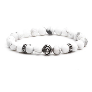 White turquoise beaded bracelet with vintage silver lion head charm and metal spacers